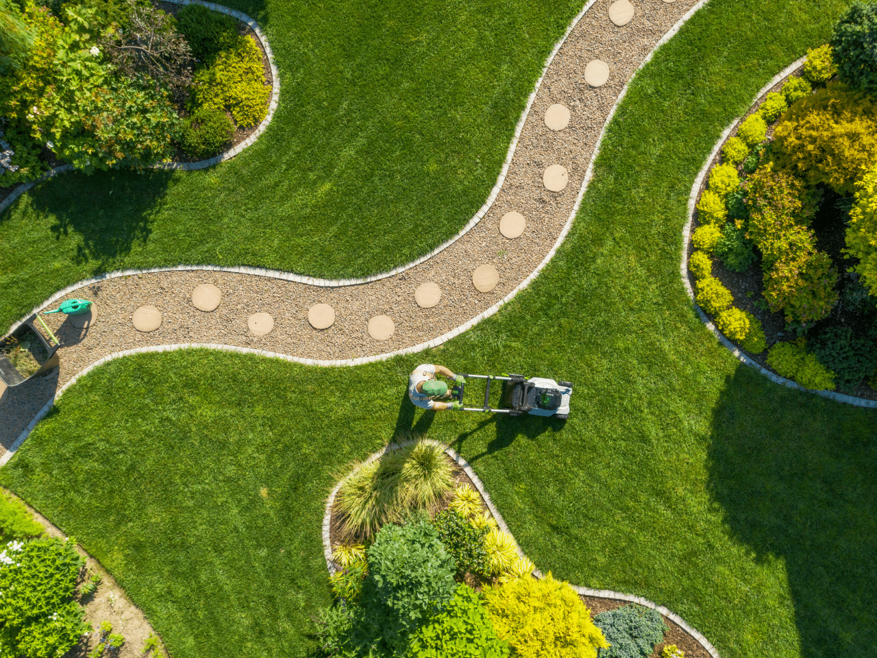 Landscaping Man in Yard with Pathway Top View